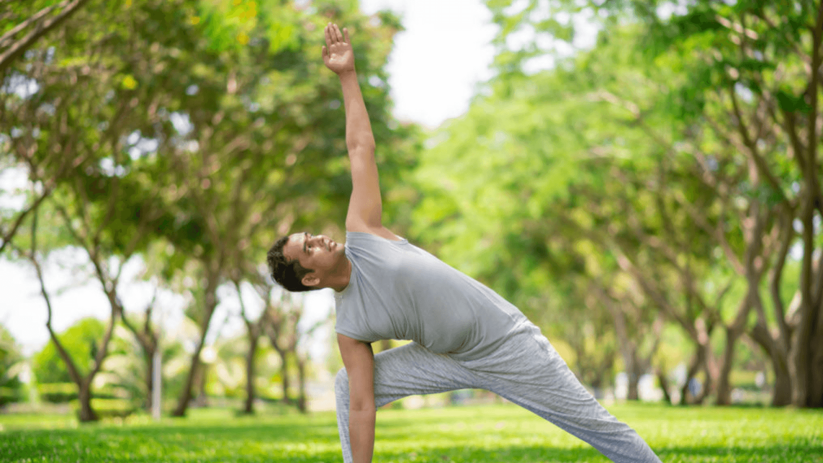 a man stretching in a garden