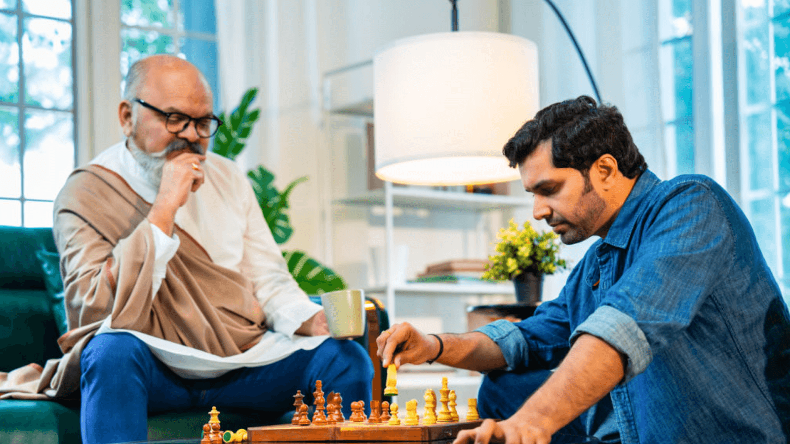 People in their midlife playing chess together
