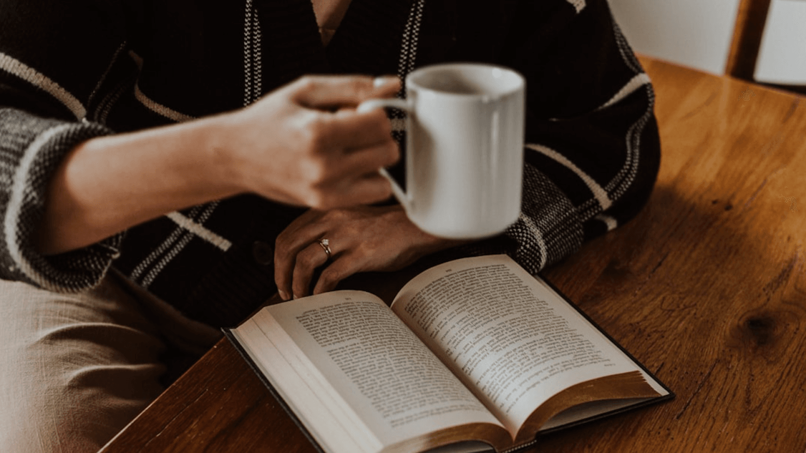 An image of a woman reading book